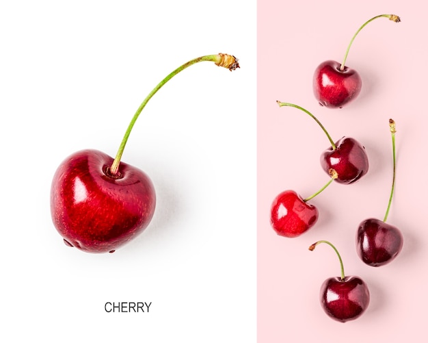 Disposition créative avec des cerises rouges fraîches sur fond rose. Concept d'alimentation saine et de nourriture