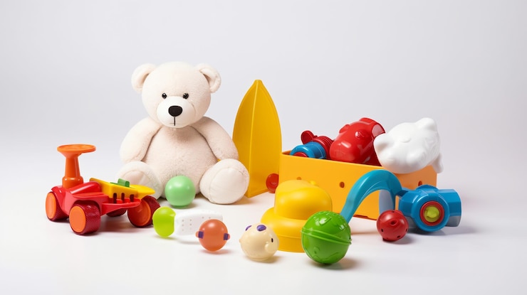 Photo divers jouets colorés pour bébé pour les activités et le plaisir de bébé comme un animal de voiture de poupée et une balle