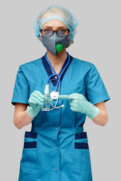 Docteur, stéthoscope, tenue, bouteille, désinfectant