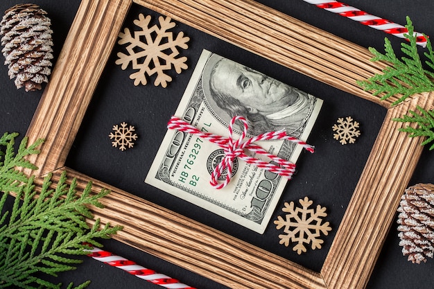 Dollars sur cadre photo en bois. Cadeau de Noël.