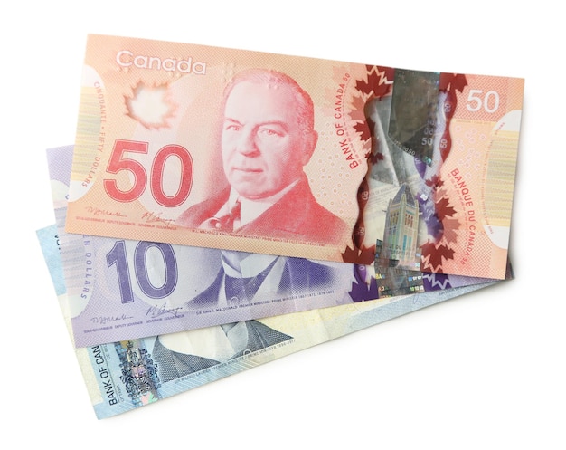 Dollars canadiens isolés sur blanc