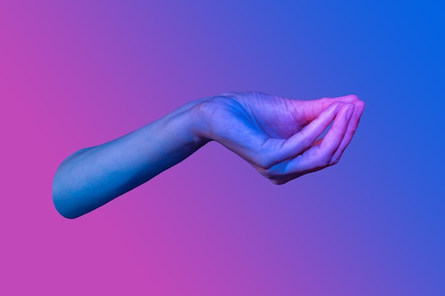 Donnez un style de collage pop art dans des couleurs vives au néon. Élément créatif psychédélique moderne avec paume humaine pour affiches, bannières, papier peint. Copiez l'espace pour le texte. Modèle de style magazine. La culture des zines.