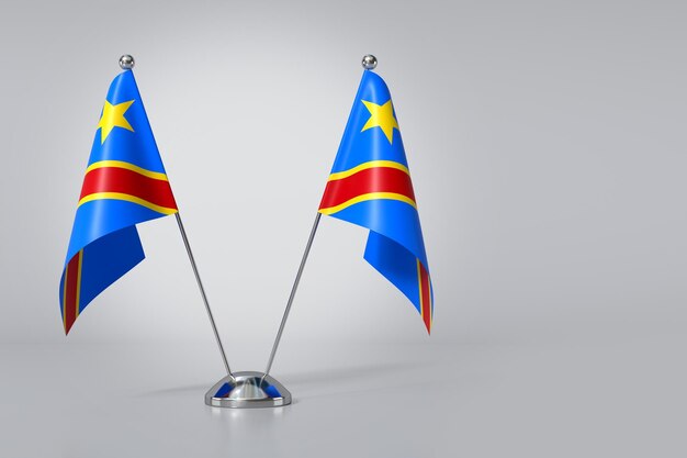 Photo double drapeau de la république démocratique du congo sur fond gris rendering en 3d