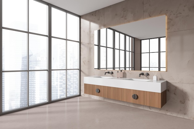 Double vasque dans la salle de bain panoramique en marbre foncé