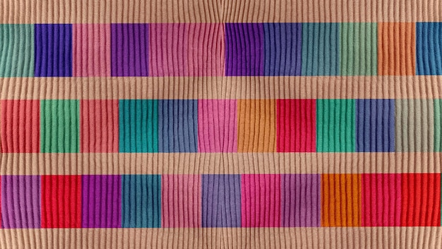 Doux fond texturé de tissu coloré chaud