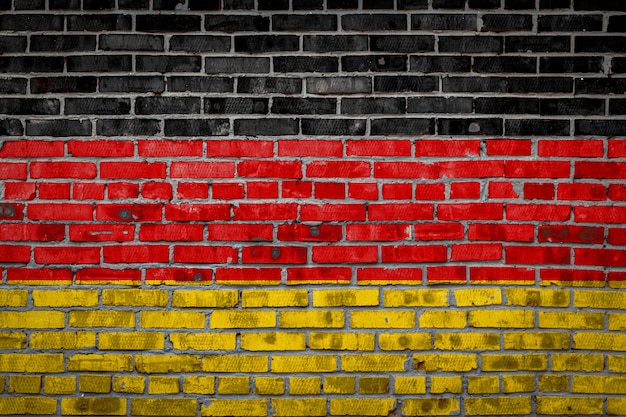 Drapeau de l'Allemagne sur un mur de briques