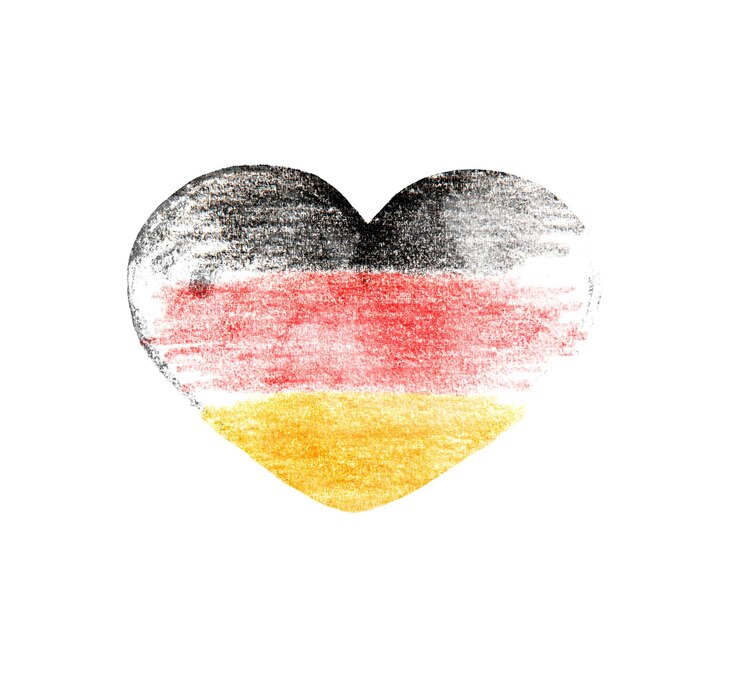 Photo drapeau allemand au cœur sur fond blanc