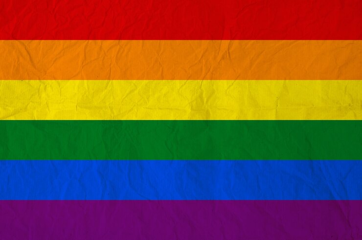 Photo drapeau de l&#39;arc-en-ciel sur fond de texture de papier vintage