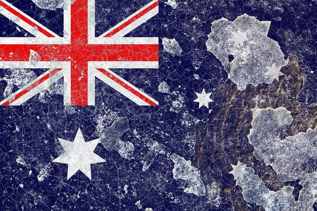 Drapeau de l'Australie sur une vieille surface endommagée de mur en béton