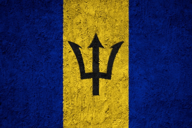 Drapeau de la Barbade sur le mur de béton grunge