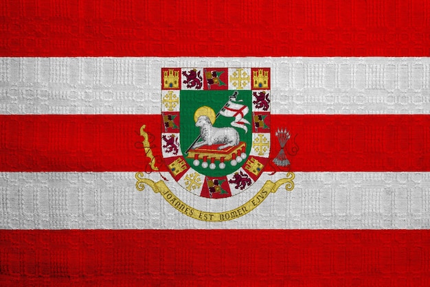 Drapeau et blason du Commonwealth de Porto Rico sur un fond texturé Collage conceptuel