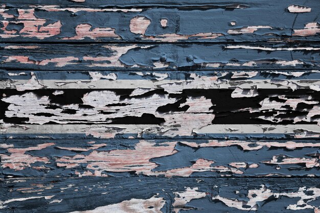 Le drapeau du Botswana peint sur une planche de bois