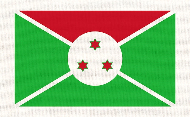 Drapeau du Burundi sur surface de tissu Drapeau national du Burundi sur fond texturé