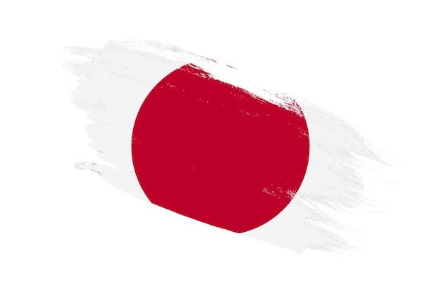 Drapeau du japon avec des effets peints au pinceau sur fond blanc isolé