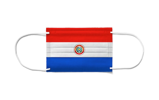 Drapeau du Paraguay sur un masque chirurgical jetable.