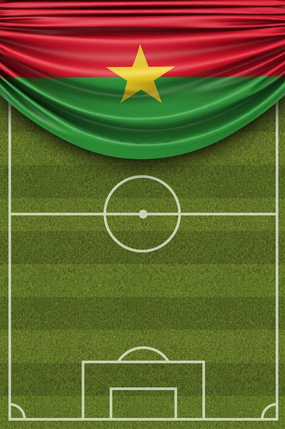 Drapeau du pays du Burkina Faso drapé sur un terrain de football rendu 3D