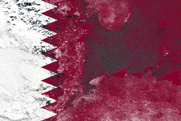 Drapeau du qatar sur une surface de mur en béton endommagé