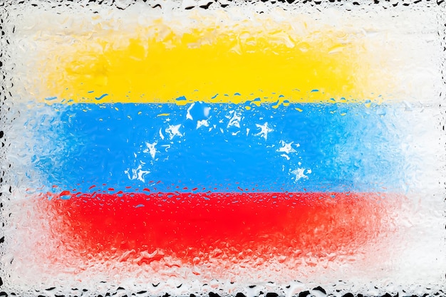 Drapeau du Venezuela Drapeau du Venezuela sur fond de gouttes d'eau Drapeau avec des gouttes de pluie Éclaboussures sur verre