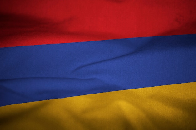 Drapeau ébouriffé de l&#39;Arménie dans le vent