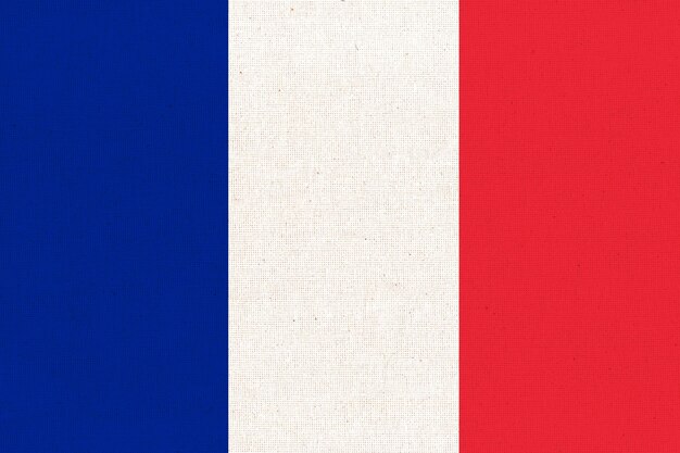 Photo drapeau de la france drapeau français sur surface de tissu texture du tissu