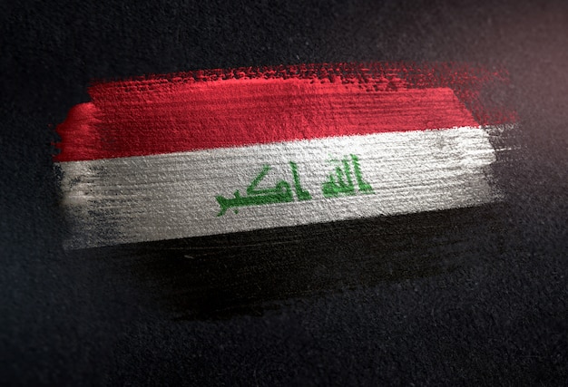 Photo drapeau irakien en brosse métallique sur un mur sombre grunge