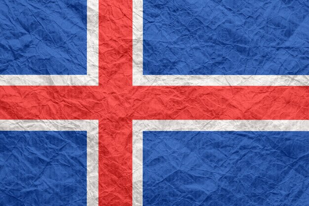 Drapeau de l'islande sur du vieux papier kraft froissé fond d'écran texturé pour la conception