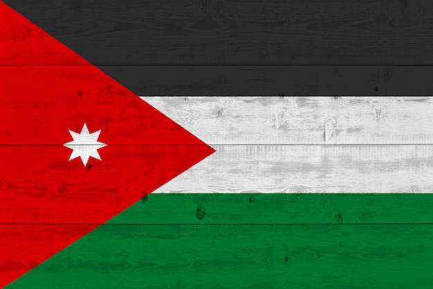 Drapeau de la Jordanie peint sur une vieille planche de bois