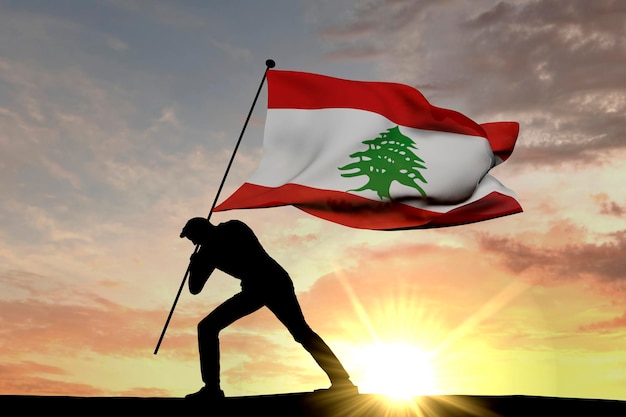 Drapeau libanais poussé dans le sol par une silhouette masculine rendu 3D