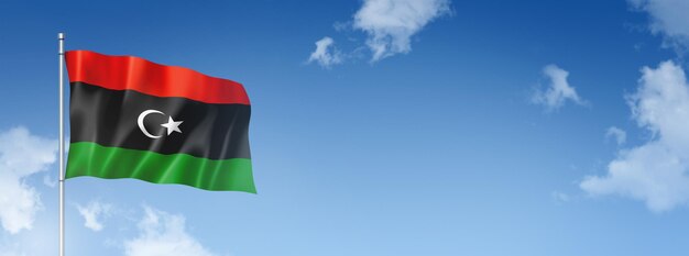 Drapeau libyen rendu tridimensionnel isolé sur un ciel bleu bannière horizontale illustration 3D