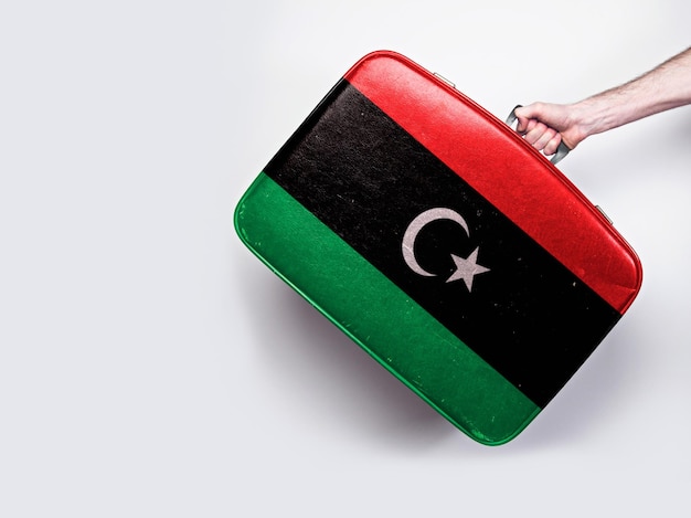 Drapeau libyen sur une valise en cuir vintage