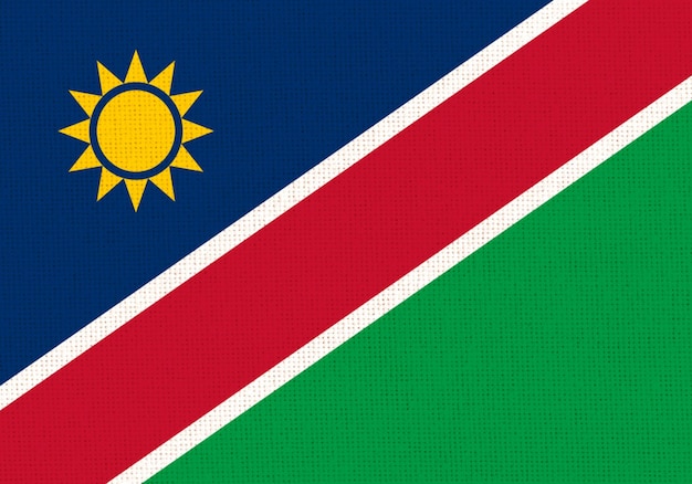 Photo drapeau de la namibie drapeau national namibien sur surface de tissu pays africain