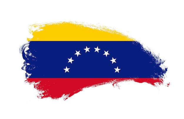 Drapeau national du Venezuela peint avec un pinceau sur blanc isolé