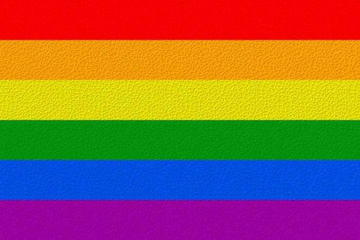 Photo drapeau national de la gay pride fond avec le drapeau de la gay pride