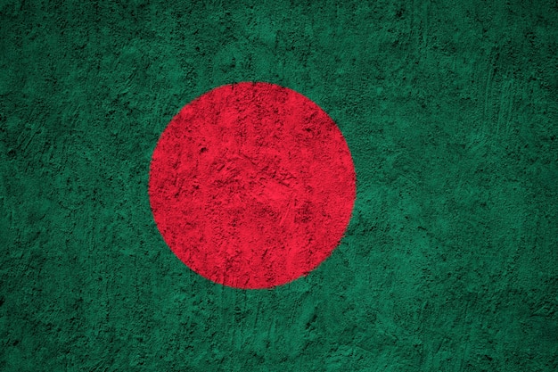 Drapeau national peint du Bangladesh sur un mur de béton