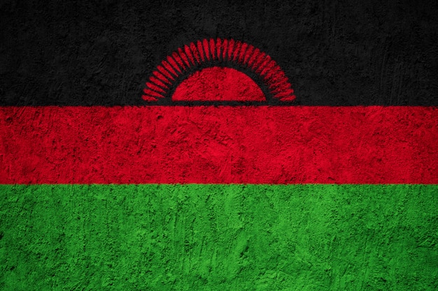 Drapeau national peint du Malawi sur un mur de béton