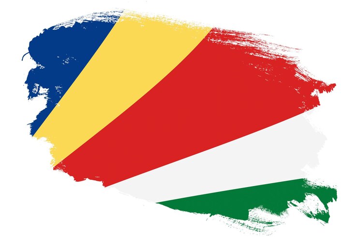 Photo drapeau national des seychelles sur fond blanc texturé pinceau coup de grunge