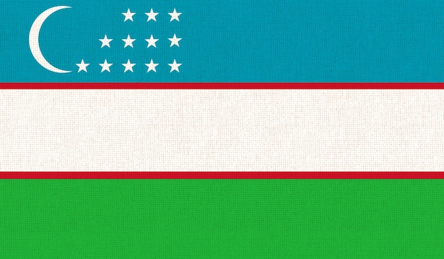 Photo drapeau de l'ouzbékistan drapeau d'un pays asiatique sur surface de tissu drapeau national ouzbek