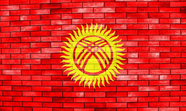Drapeau de la République kirghize sur un fond texturé Collage conceptuel