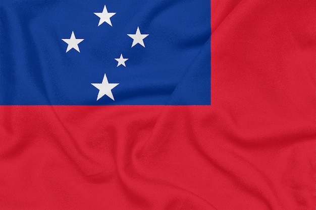 Drapeau des Samoa sur tissu texturé. Symbole patriotique