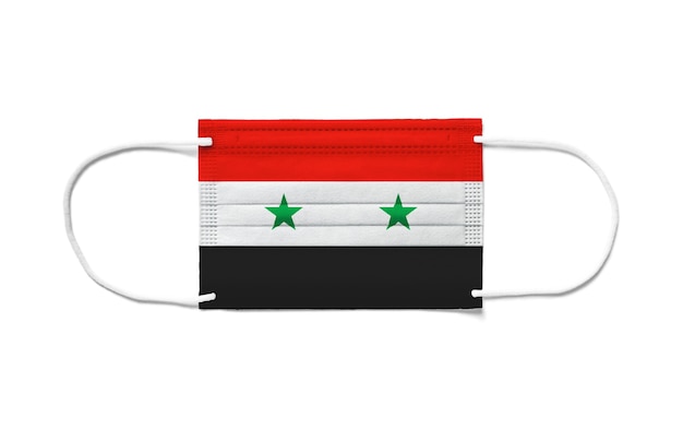 Drapeau de la Syrie sur un masque chirurgical jetable