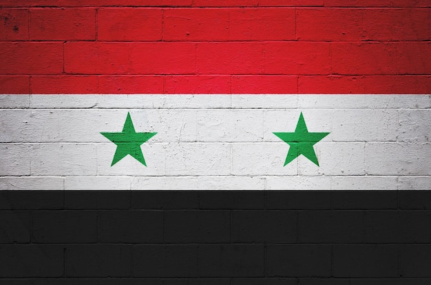 Drapeau de la Syrie peint sur un mur