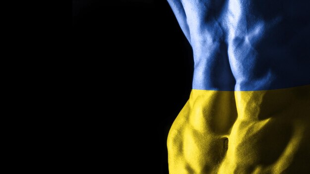 Drapeau de l'Ukraine sur l'entraînement sportif national des muscles abdominaux, concept de musculation, fond noir