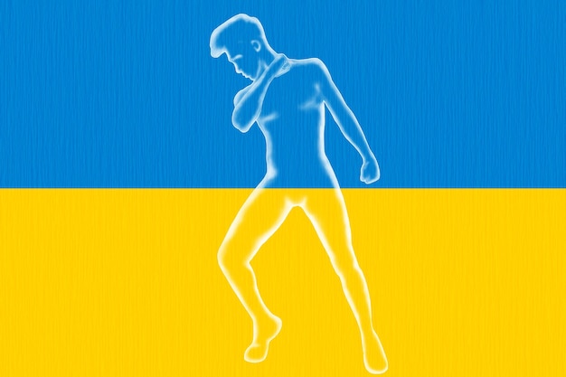 Le drapeau de l'Ukraine et la figure d'un homme se battent pour le concept de liberté