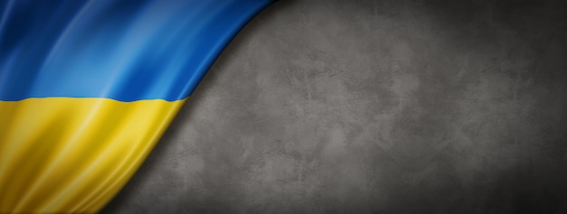 Drapeau de l'Ukraine sur le mur de béton. Bannière panoramique horizontale. Illustration 3D