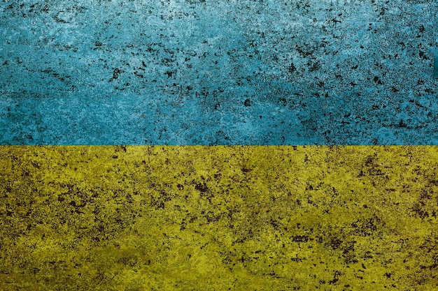 Drapeau de l'Ukraine sur le vieux mur de grunge en arrière-plan