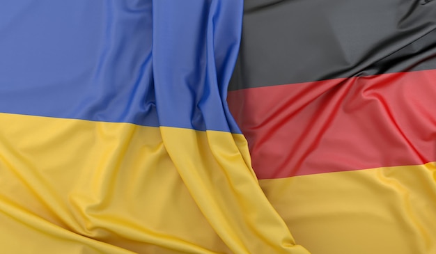 Drapeaux ébouriffés de l'Ukraine et de l'Allemagne rendu 3D