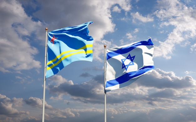 Drapeaux d'état d'Israël et d'Aruba ensemble sur fond de ciel