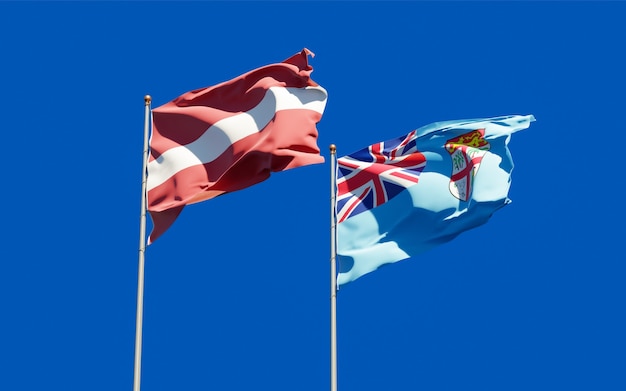 Drapeaux des Fidji et de la Lettonie. Illustration 3D