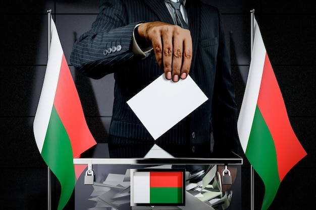 Drapeaux de Madagascar main laissant tomber le concept d'élection de carte de vote illustration 3D