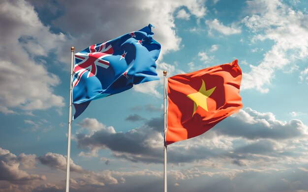 Drapeaux de la Nouvelle-Zélande et du Vietnam sur fond de ciel